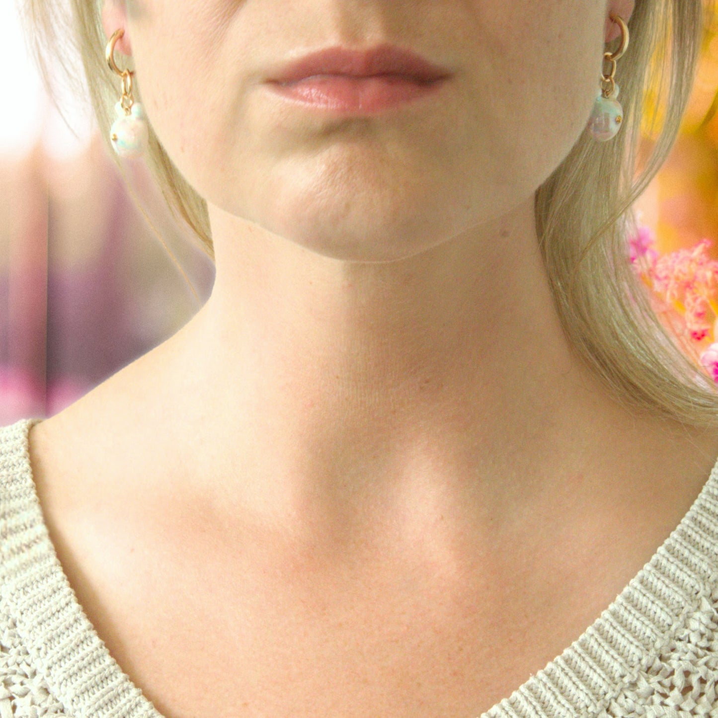 Porcelain and gold-filled earrings with Bear charms on the model